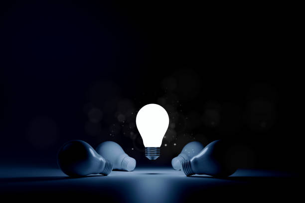 Light bulb bright outstanding among lightbulb on white background. Concept of creative idea and inspire innovation, Think different, Standing out from the crowd. 3d rendering illustration stock photo