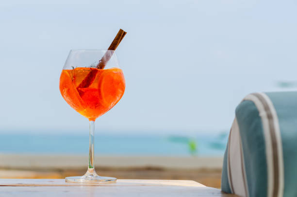 istock A glass of orange cocktail puts on table 1397638340