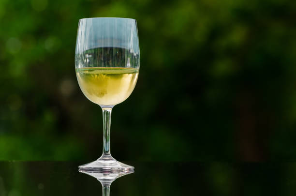 istock A glass of white wine put on table 1397638435