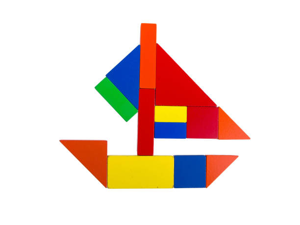 Colourful wooden tangram isolated on white background