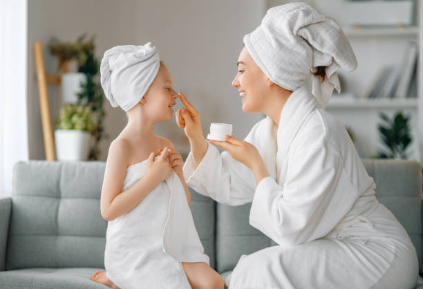 istock Mother and daughter after a bath 1397644440