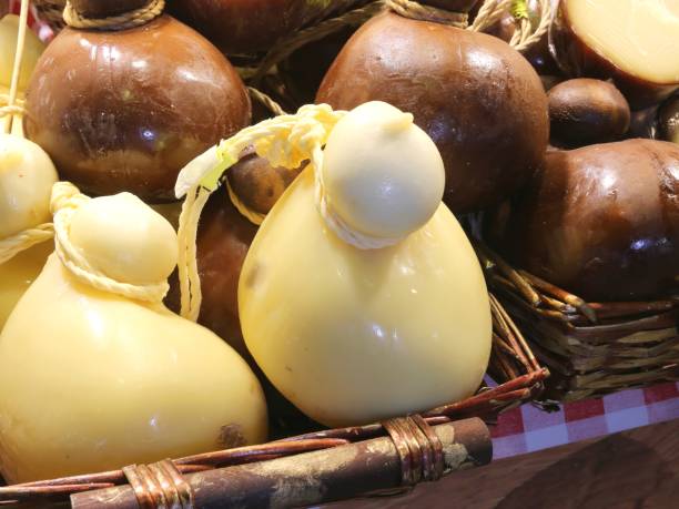 istock typical cheese called caciocavallo in italian language for sale in a dairy 1397648756