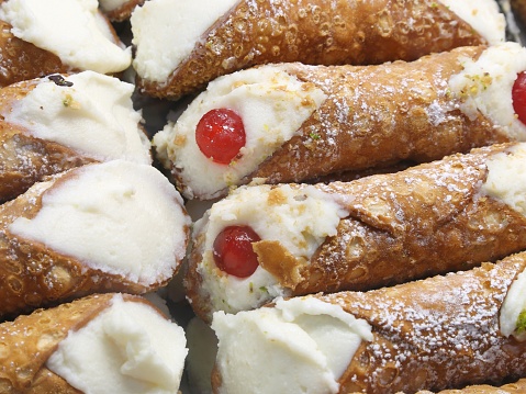 pastry called CANNOLO SICILIANO in Italian Language for sale at sicilian pastry shop
