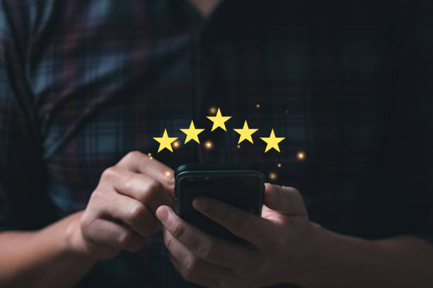 istock Customer satisfaction concept. Hand with thumb up Positive emotion smiley face icon and five star with copy space. 5 star satisfaction, Excellent business rating experience 1397651793