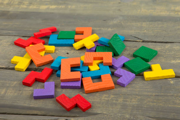 istock Creative solution for idea - business concept, jigsaw puzzle on the wooden desk 1397656226