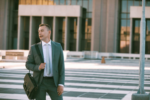 istock Businessman with his bag 1397659714