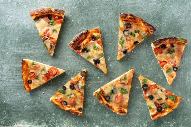 istock Italian pizza margherita cut into pieces 1397662976