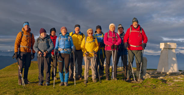istock Hiker friends standing on mountain 1397666851