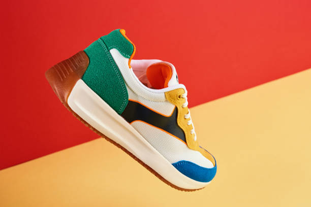 istock Stylish trendy shoes on colorful background 1397671475