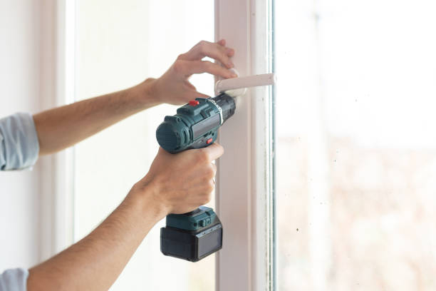 istock The worker installing and checking window in the house 1397675509
