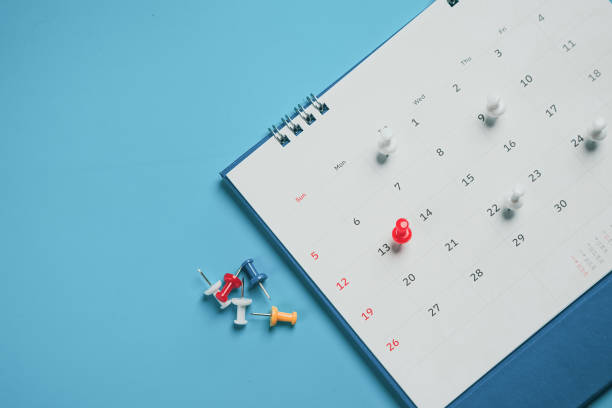 istock Close top view on white calendar 2022 month schedule Work planning and life concept. 1397675590