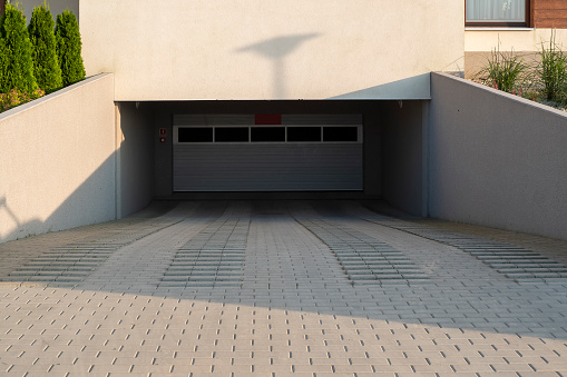 Underground multi-storey garage entrance on a sunny summer day