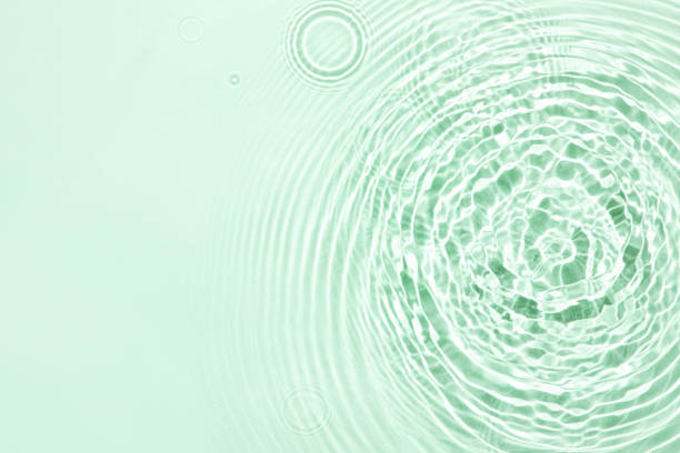 istock The texture of water on a green background. 1397679156