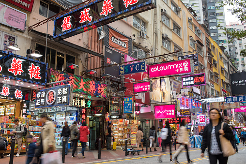 Hong Kong Island, Hong Kong - December 9, 2018: Drugstore and pharmacy neon signs in Lockhart Road, Causeway Bay.