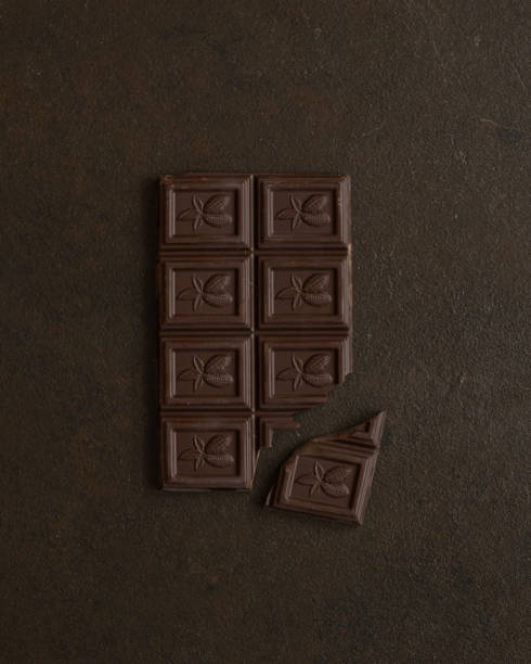 Chocolate bar with chipped piece of chocolate