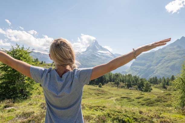 istock Woman explores freedom in nature 1397683476