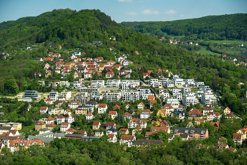 Housing estate in landscape, aerial perspective\nJena, Germany