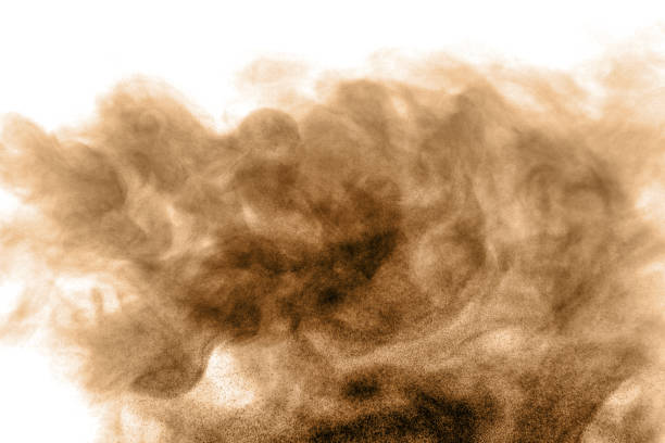 istock Brown black dust powder explosion. The texture is abstract and splashes float. 1397684711