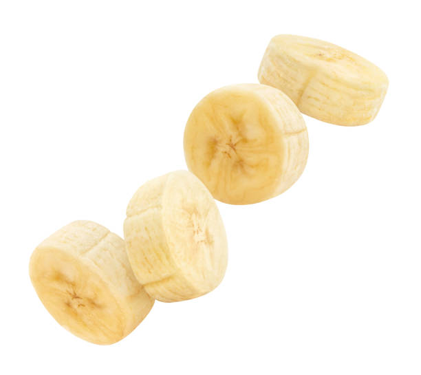 istock Flying banana slices on white 1397684859