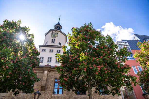 town hall of Jena in Thuringia, Germany\nIntershop Tower in the background\n\nJena is a university city in central Germany on the river Saale. Jena is a manufacturing city, specializing in precision machinery, pharmaceuticals, optics and photographic equipment