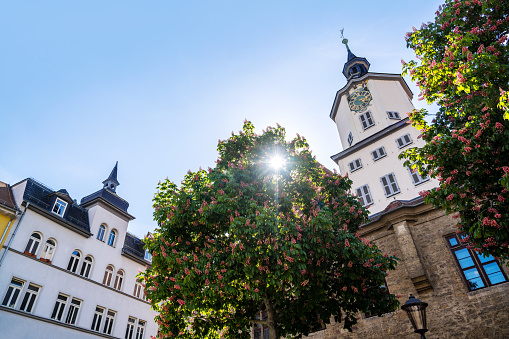 town hall of Jena in Thuringia, Germany\nIntershop Tower in the background\n\nJena is a university city in central Germany on the river Saale. Jena is a manufacturing city, specializing in precision machinery, pharmaceuticals, optics and photographic equipment
