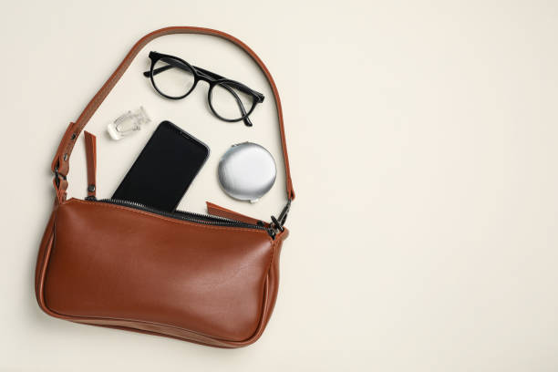 istock Stylish women's bag and different stuff on white background, flat lay. Space for text 1397685931