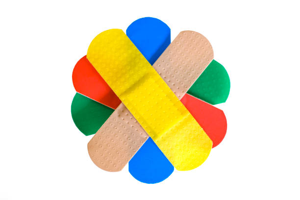 Colorful adhasive band aids isolated on white