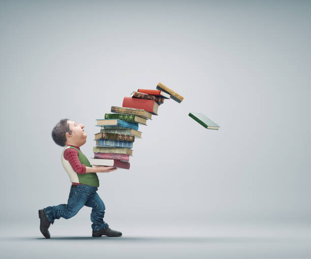 istock Old man carries a big stack of books. 1397688877