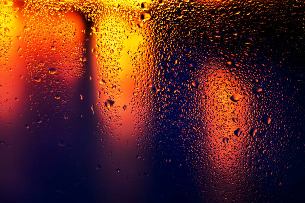 istock Condensation on the clear glass window. Water drops. Rain. Abstract background texture 1397692356