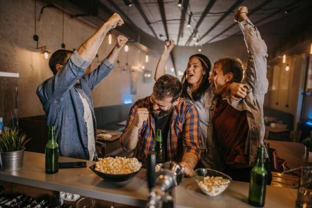 istock Sports fans in pub 1397694344