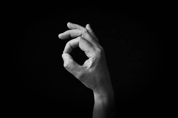 istock OK Hand emoji isolated on black background 1397696472