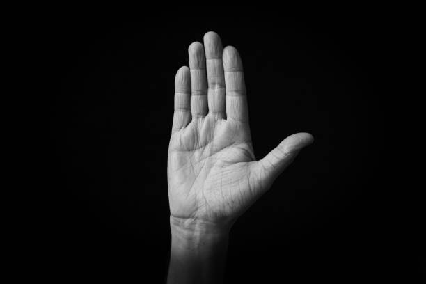 istock Raised Hand emoji isolated on black background 1397697185