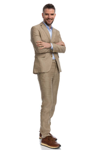 istock unshaved middle aged man smiling and crossing arms 1397697480