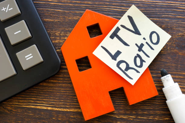 a wooden mini house with a sticky note that says ltv ratio