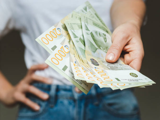 istock Two thousand Serbian dinars banknotes in hand. 1397697926