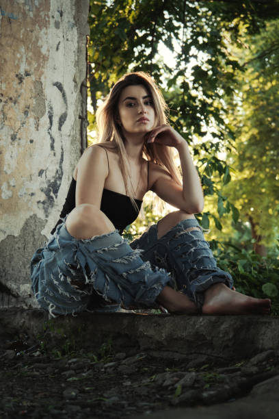 istock tramp girl sitting 1397698511