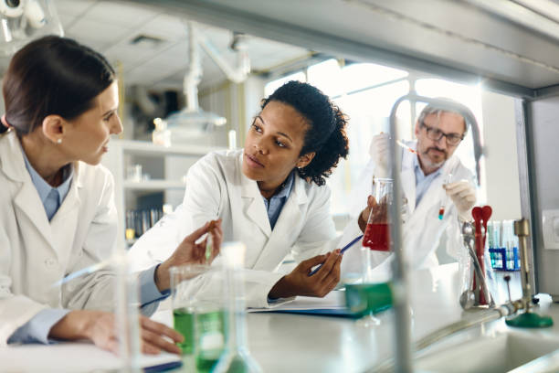 istock Young scientists talking about medical research in laboratory. 1397700413
