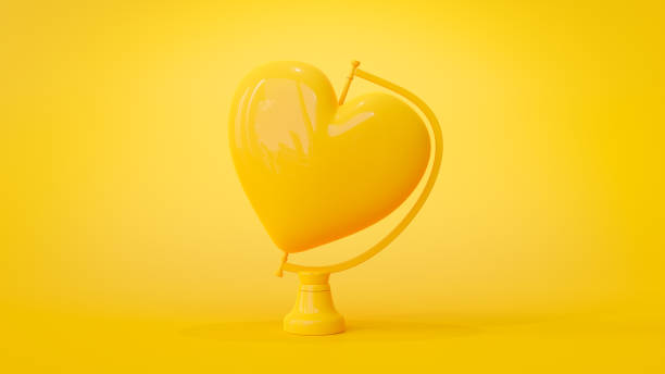 istock yellow heart on rotating platform. on yellow background. 1397701454