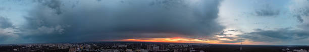 istock Wide aerial sunset cloudscape panorama above city 1397702084