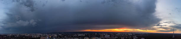 istock Wide aerial sunset cloudscape panorama above city 1397702100