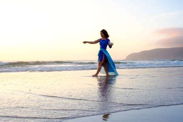 istock Blue fairy representing the water element dancing in nature 1397703417
