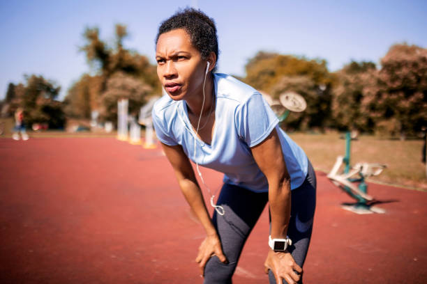 istock African-american woman resting after running 1397707717