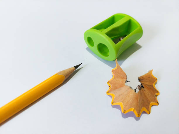istock Pencil with sharpening shavings on white background 1397707779