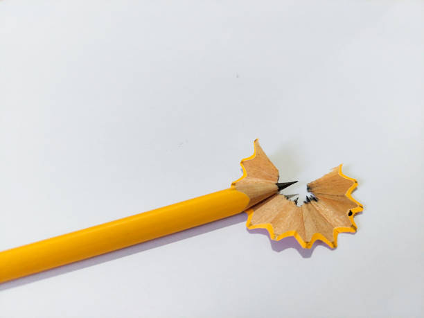 istock Pencil with sharpening shavings on white background 1397707922