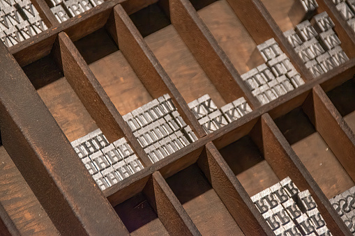 A collection of metal letters used in letterpress printing (also known as relief or typographic printing) is seen in an old newspaper printing room.