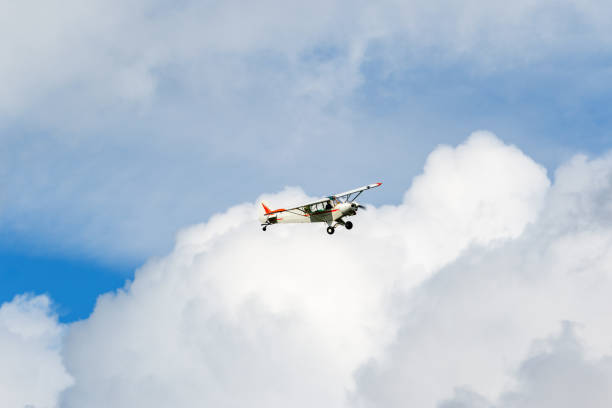 istock Aircraft flying in the clouds in the sky 1397709149