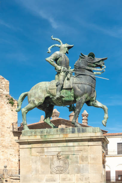 Trujillo, Spain - 16th April 2022. Equestrian statue representing the 'Conquistador of Peru', Francisco Pizarro, in the Plaza Mayor of Trujillo, Extremadura, Spain. The statue is by the American sculptor Charles Cary Rumsey 1879 - 1922) and was gifted to Trujillo by his widow in 1929.