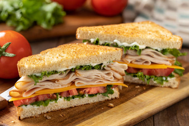istock Turkey sandwich on toasted bread cut in half 1397715881