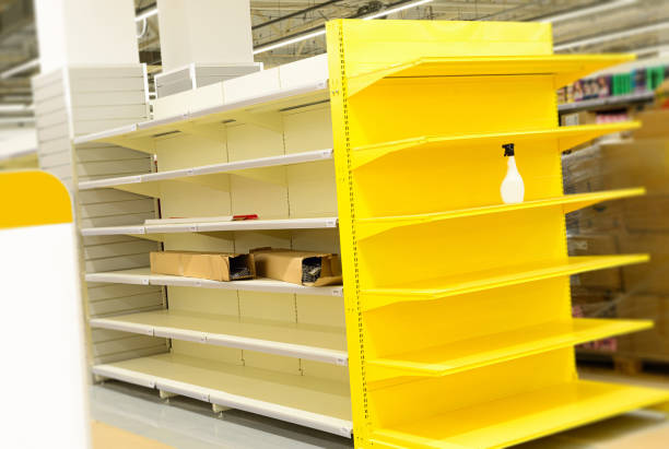 istock mounting new shelves in supermarket 1397716416
