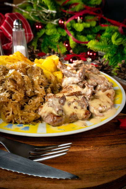 istock Stewed pork loin in a sauce with chanterelles. 1397718120